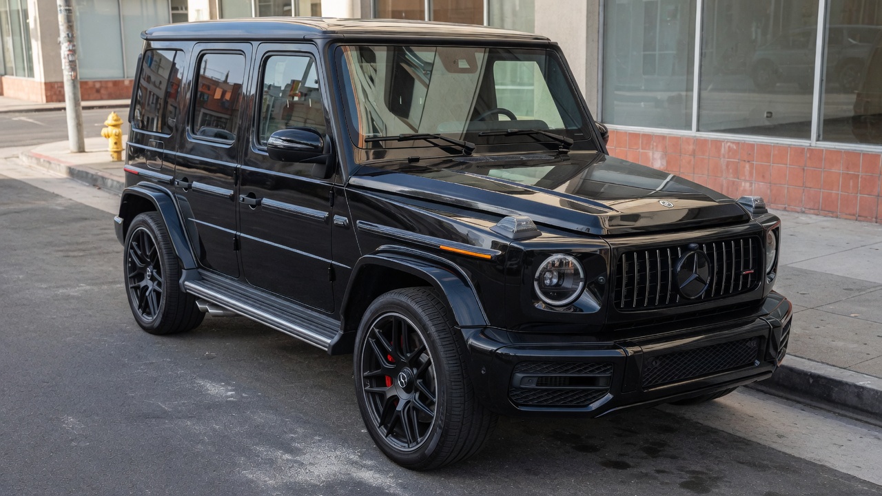 Black Mercedes-Benz G-Class AMG parked on a city street