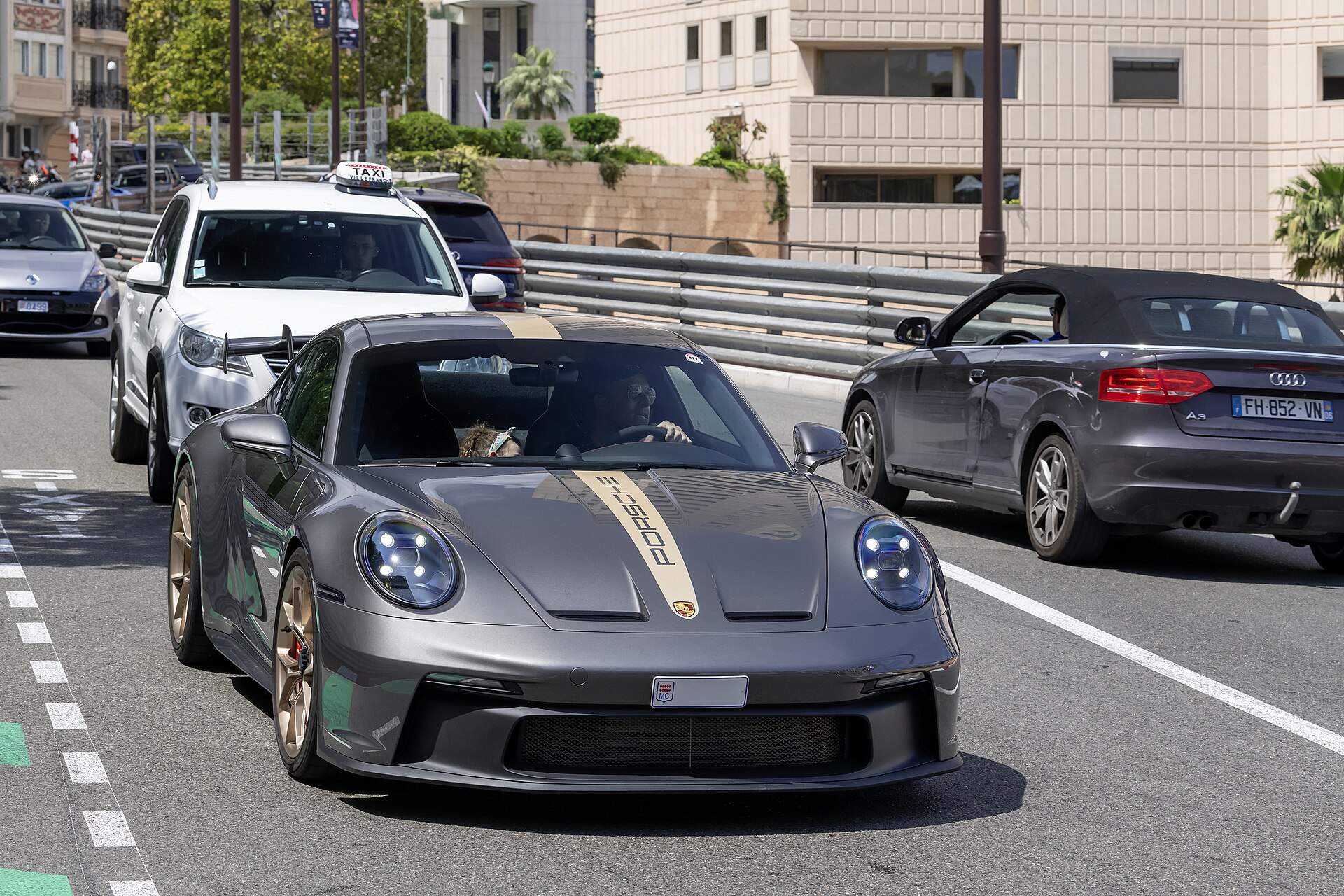 Grey Porsche 911 GT3 on a city street